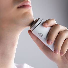 China Mini Portable recargable de la máquina de afeitar eléctrica con el grueso delgado 0.07m m de la red del cuchillo fábrica